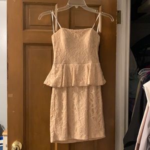 A cream, short, lace dress. Only worn once